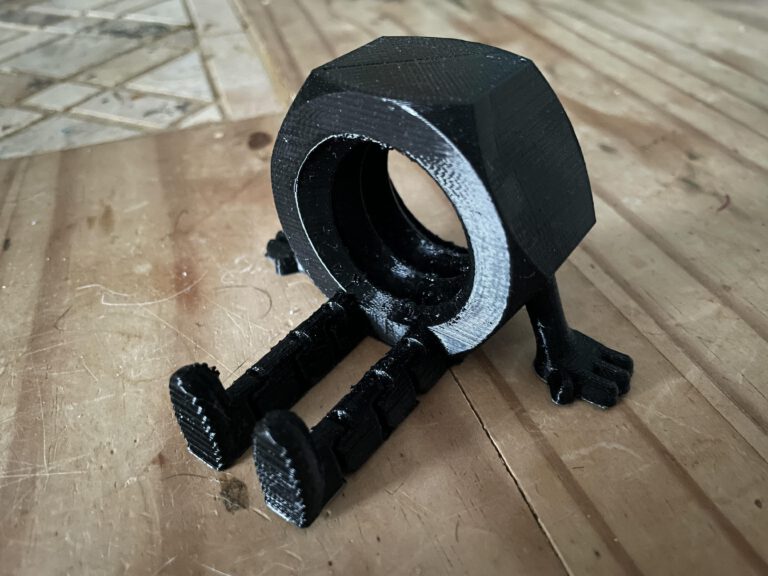 3D print of a bolt, with arms, and legs, meant for decortion